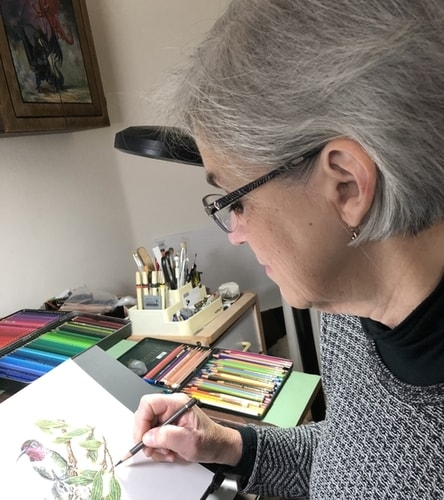 Artist Jeanne Cardana working in her studio