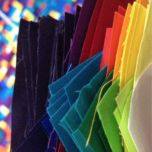Close up of fabric swatches used by Alexandra Kingswell in her fiber art
