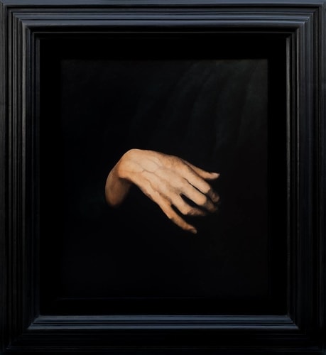 Framed oil painting of a hand by Barbara Hangan