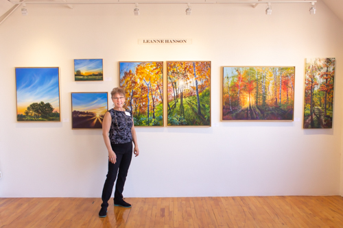 Artist Leanne Hanson at an exhibition of her paintings