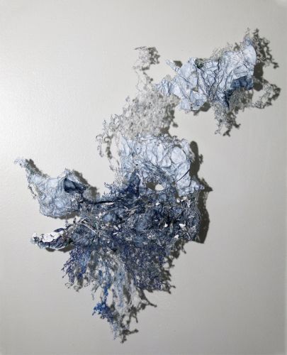 Abstract fiber art made from thread and Tyvek envelopes by Carla Fisher
