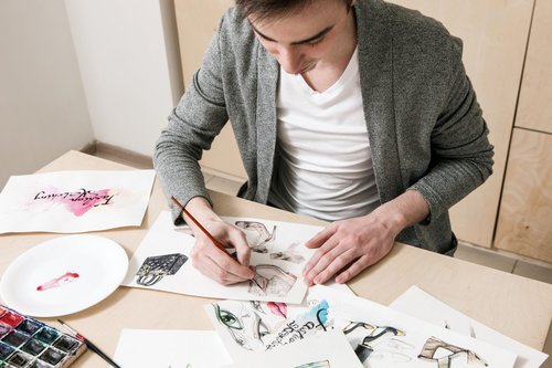 Artist working on a drawing