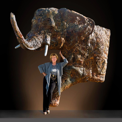 Artist Gabrielle Fischer with her Bronze Sculpture of an elephant