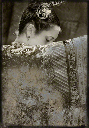 Photograph of a Chinese empress in imperial embroidered silk by Lisa Powers