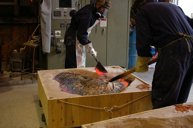 Artist Gabrielle Fischer pouring bronze