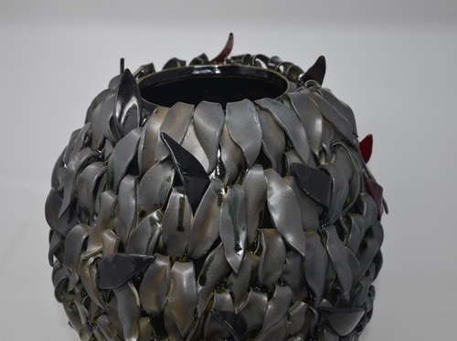 Contemporary ceramic vase with leaf pattern by Daniela Kouzov