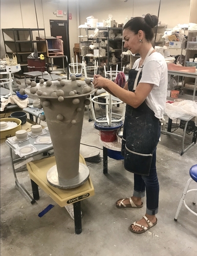 Artist Daniela Kouzov at work in her studio