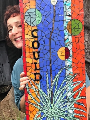 Artist Carol Davis with her glass mosaic art