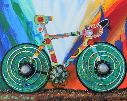 Mixed media and collage assemblage of a bike by Holli May Thomas