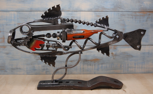 Reclaimed metal sculpture of a trout by Christian Schoenig