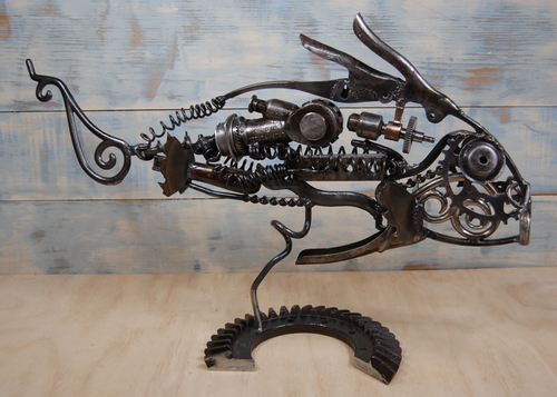 Reclaimed metal sculpture of a fish by Christian Schoenig