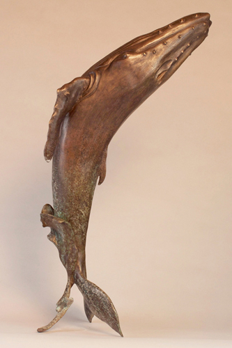 Bronze sculpture of a whale by Janet MacKay