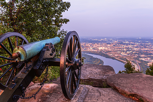 Digital Photograph of a cannon overlooking a town by Luis Almeida