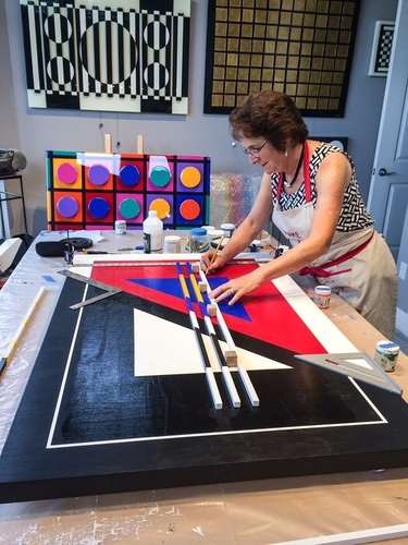 Artist creating 3D geometric art