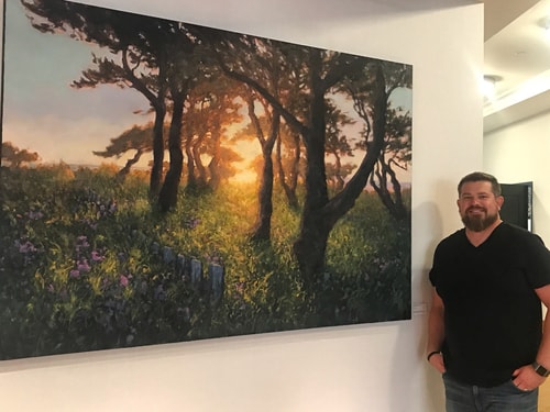 Artist Michael Orwick with his painting "Borrowed Colors of the Sea"