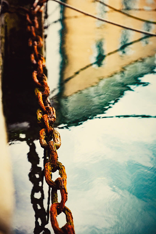 Photograph of a chain over the water