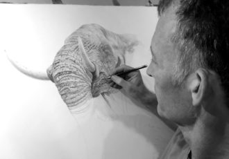 Artist John Rainbird working on "Splash of the Titan"