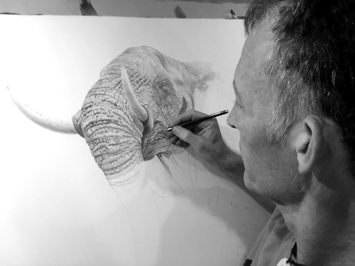 Artist John Rainbird working on "Splash of the Titan"