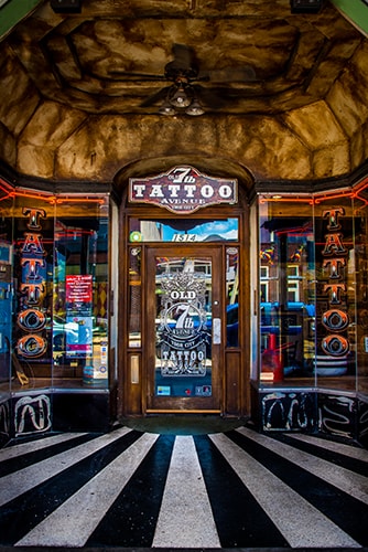 Photograph of a tattoo parlor door in Ybor City, Tampa, Florida by Jenny Nordstrom