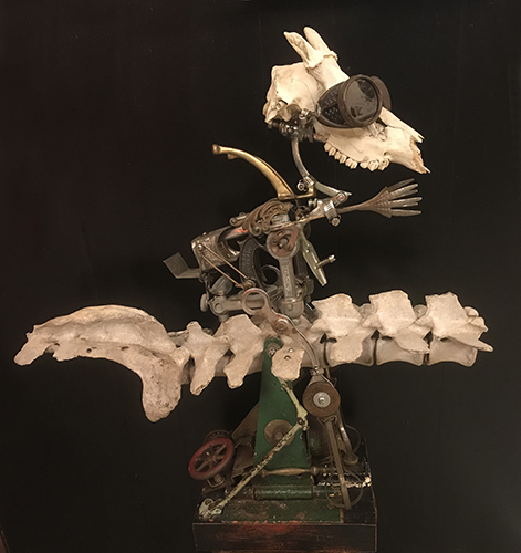 skull assemblage with aviator goggles by Sue Moerder