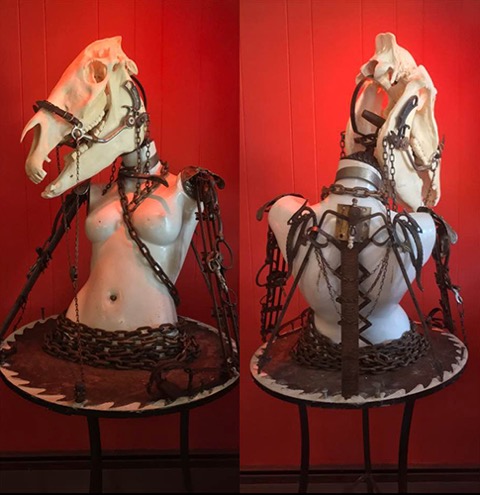 skull assemblage of a chained torso by Sue Moerder
