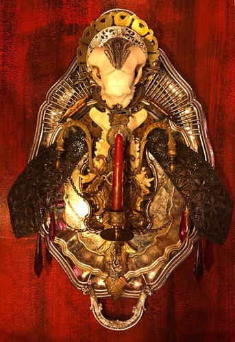skull assemblage candle sconce by Sue Moerder