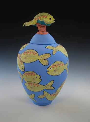 Hand thrown ceramic lidded vessel with blowfish design by Barbara Mann