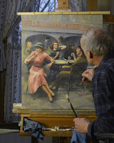 photo of artist Wesley Lowe at work on his painting "French Cafe"