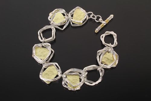 hand made silver and gold linked bracelet by Sana Doumet