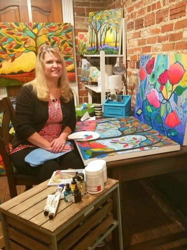 Artist Peggy Davis in her studio