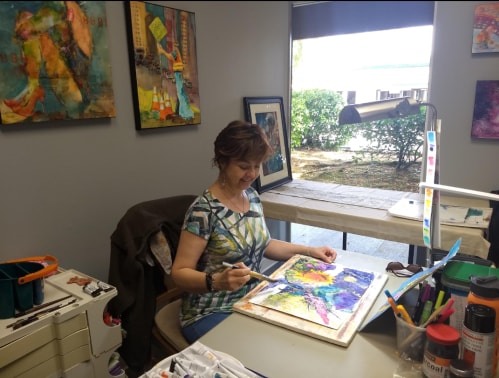 Artist Magali Lenarczak at work in her studio