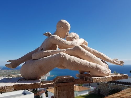 ceramic sculpture of a couple kissing by Mitch Barrett