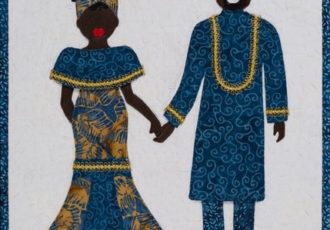 fabric collage of an African-American couple in traditional clothing by Linda Keene