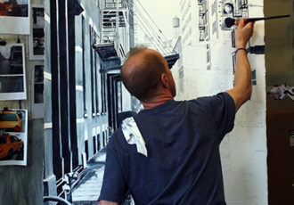 Artist painting in the studio