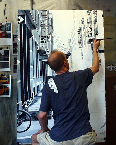 Artist painting in the studio