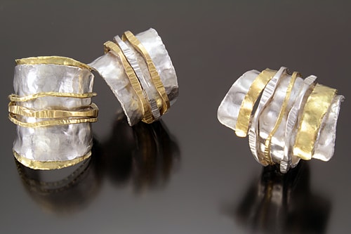 three silver and gold hand made rings by Sana Doumet