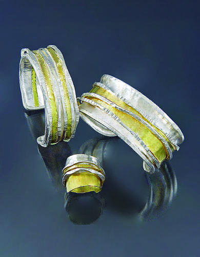 two cuff bracelets and a ring by Sana Doumet