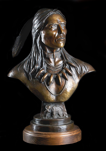 bronze bust of a native American bear hunter by Rick hill