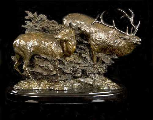 bronze sculpture of two deer by Rick Hill