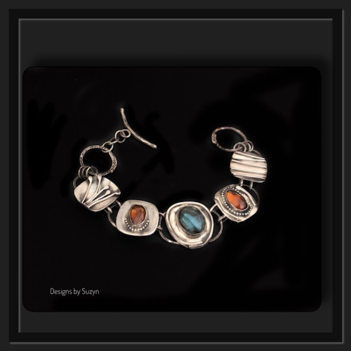 Argentium and sterling silver link bracelet with labradorite and hessonite garnet by Suzyn Gunther