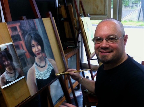 Artist Josh Lance painting in the studio in Taiwan