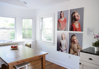 Photo portraits hanging on display