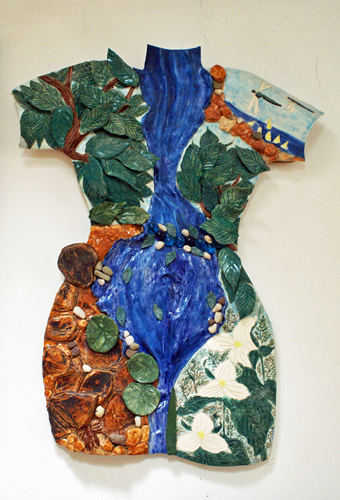 stoneware torso decorated with nature artifacts by Audrey Kay Dowling