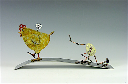 mixed media sculpture of an egg and a hen by Tomoaki Orikasa