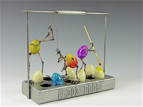 mixed media sculpture of eggs making friend eggs by Tomoaki Orikasa