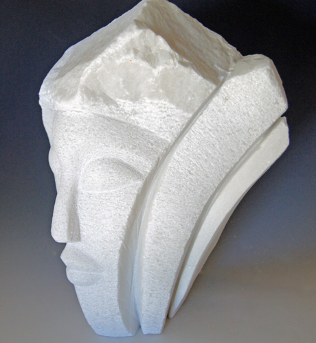 abstract carved marble head by Jean-Frederic Batasse