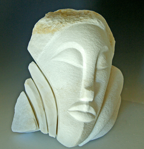 abstract carved marble head by Jean-Frederic Batasse