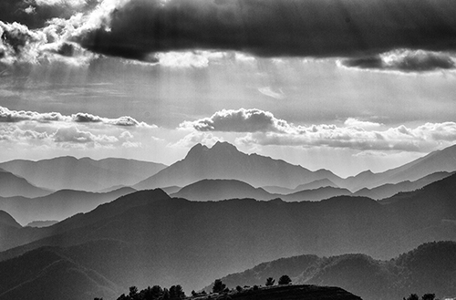 black and white photography of mountains by Mark Basterfield