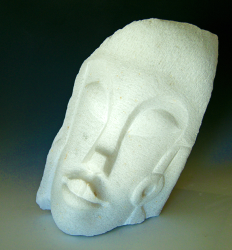 abstract carved marble head of a girl by Jean-Frederic Batasse