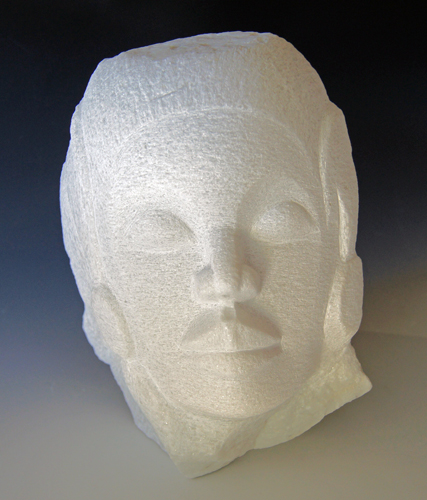 carved marble head of a lady by Jean-Frederic Batasse